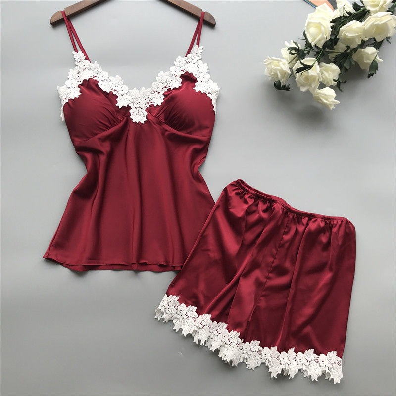 In te ademen van het de Nachtkledingssatijn van Vrouwenpyjama's Tweedelige het Kantlingerie Vastgesteld V - hals